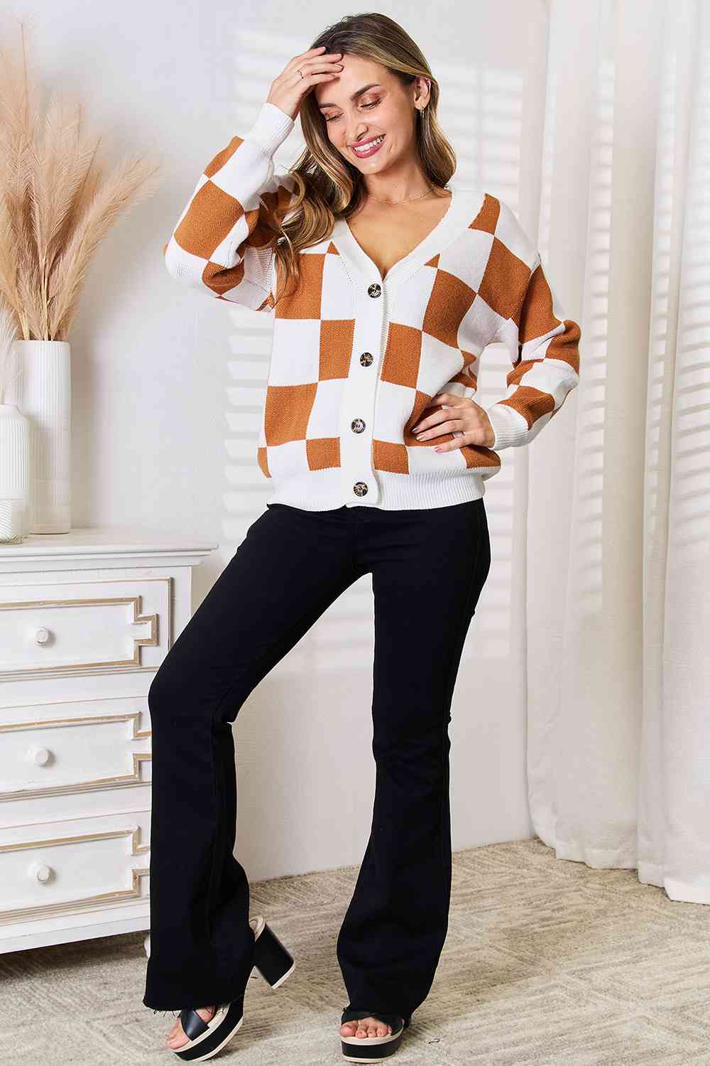 Brown and white checkered sweater