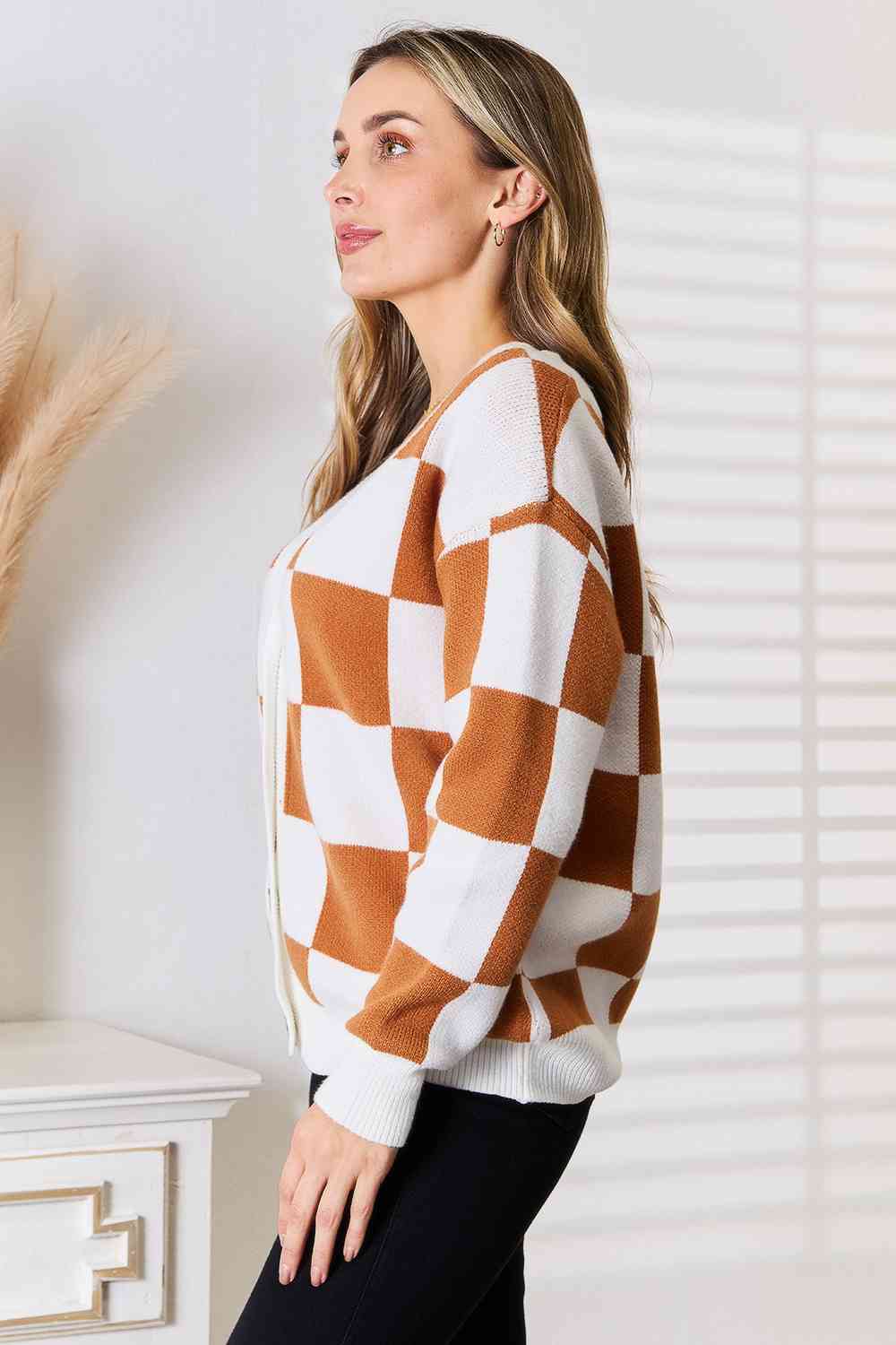 Brown and white checkered sweater