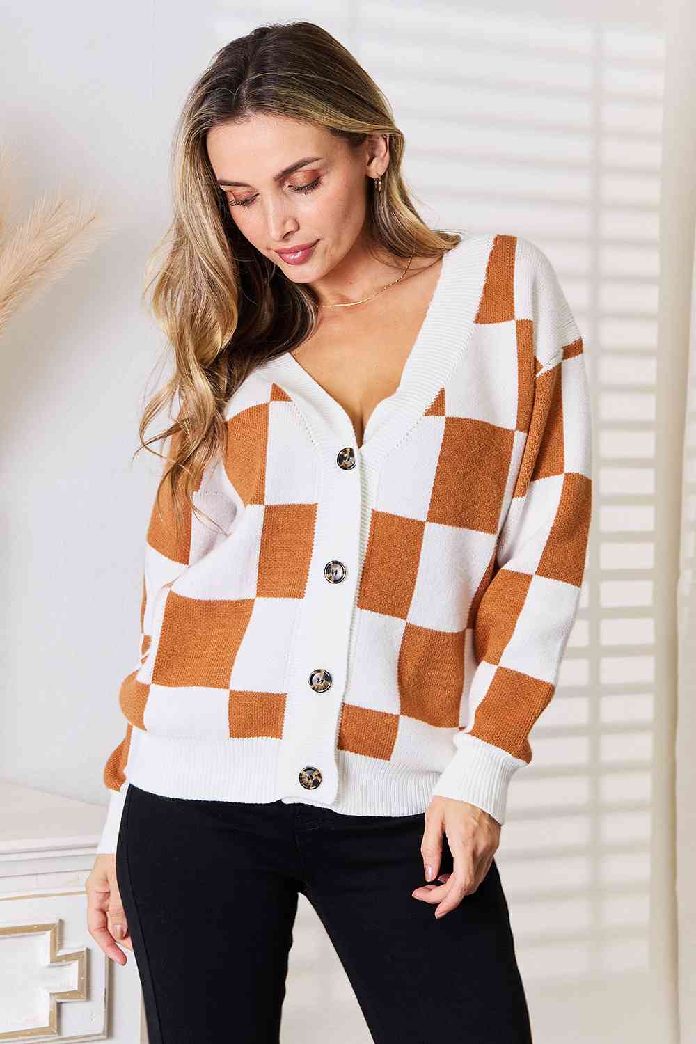 Brown and white checkered sweater