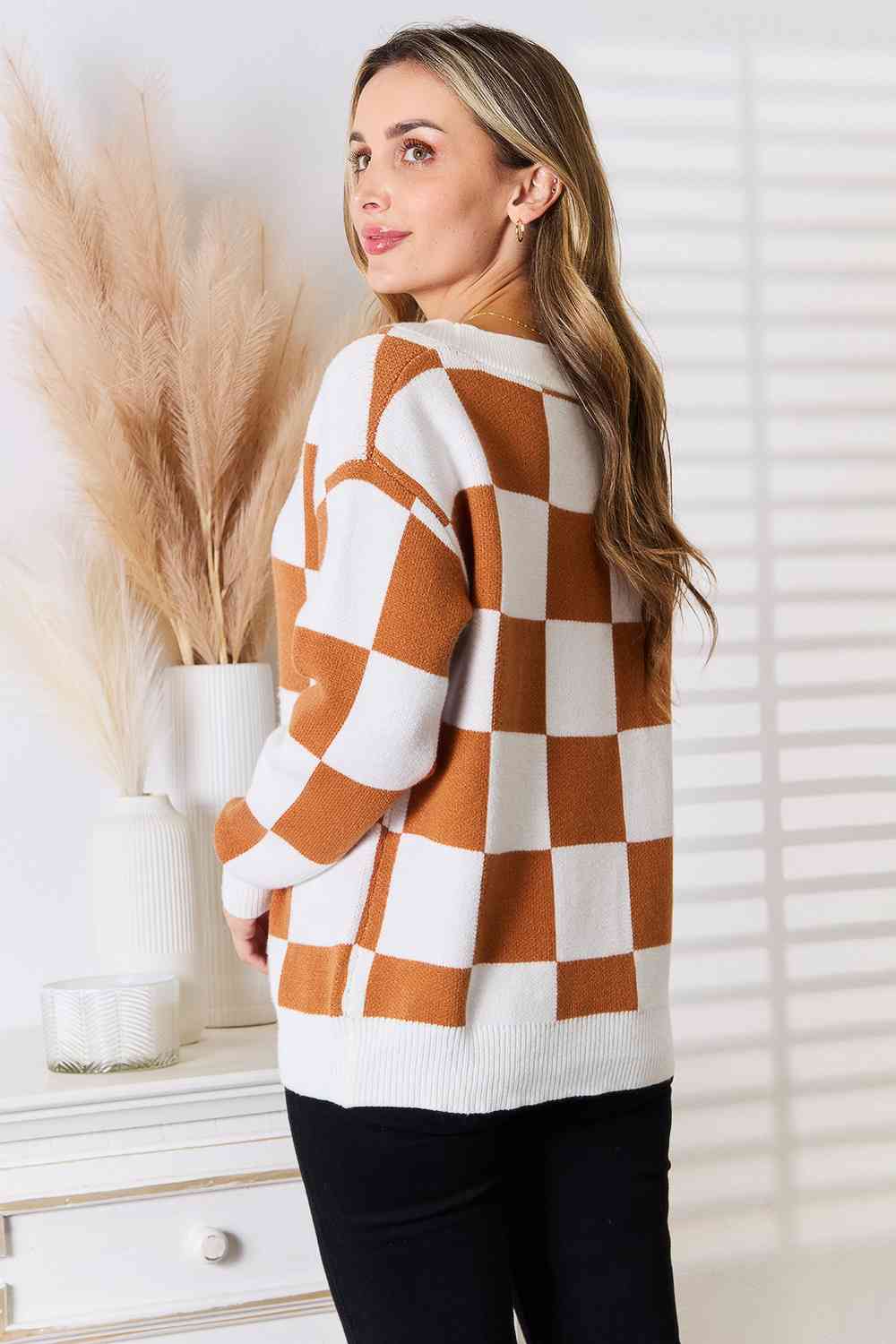 Brown and white checkered sweater