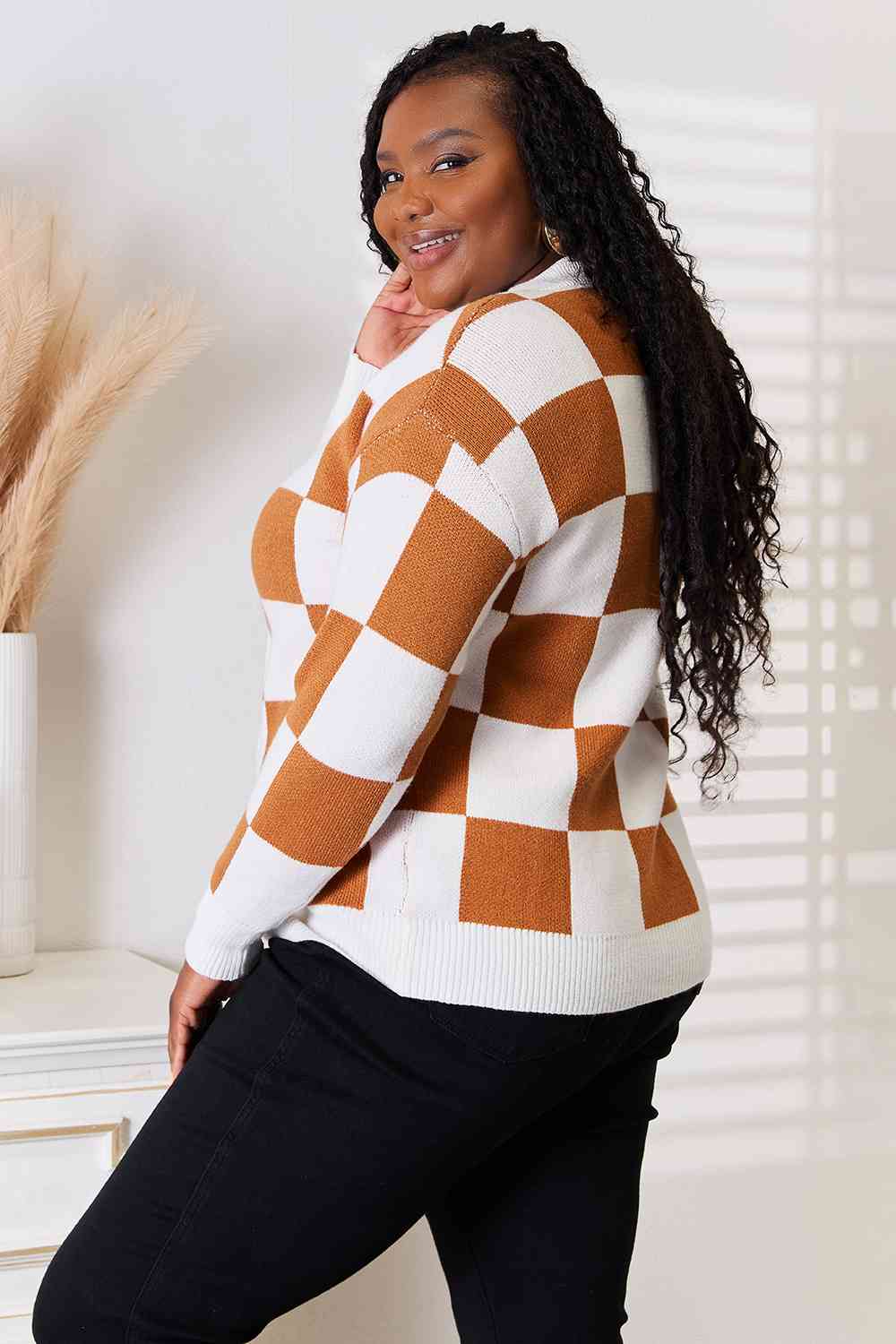 Brown and white checkered sweater