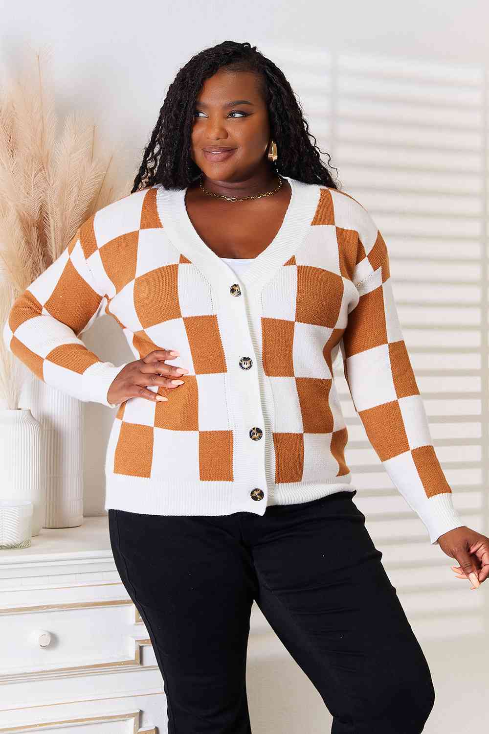 Brown and white checkered sweater