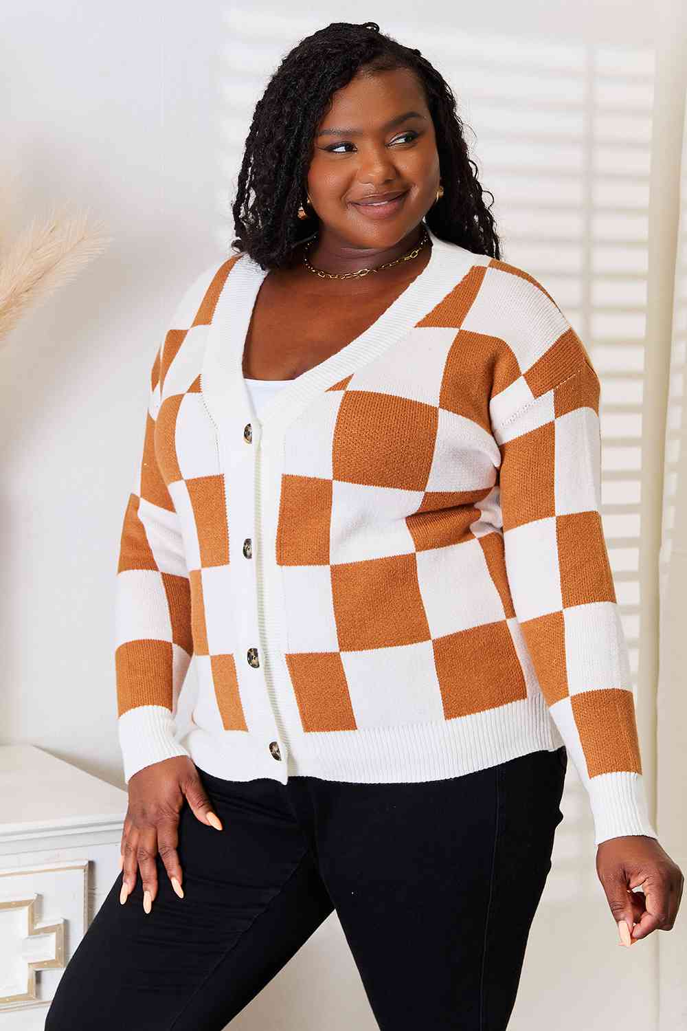 Brown and white checkered sweater